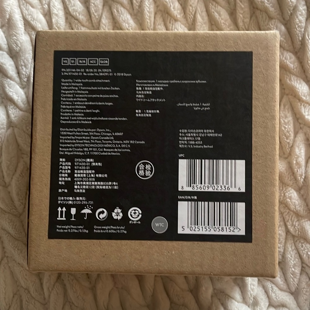 Dyson air wrap hair comb. Brand new in box
